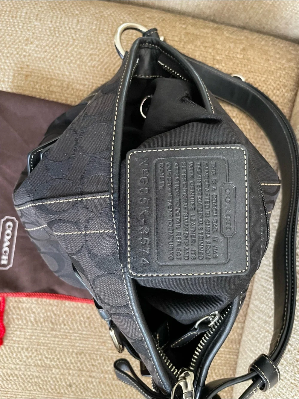 Coach Black Signature Canvas Hobo Bag with Silver Buckle Accents